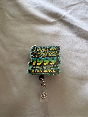 Holographic '1999' Badge Reel - I Built My Plans Around the World Ending